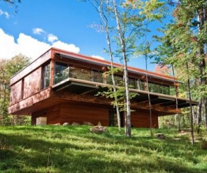 This contemporary green residence looks to be an amazing adventure for children and g...