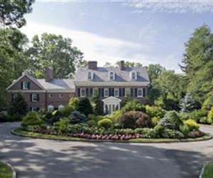 The 1900 Colonial offers striking architecture, 8 fireplaces, grand living and dining...