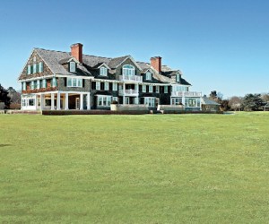 Majestically overlooking the pristine waters of Quantuck Bay in Westhampton Beach sta...